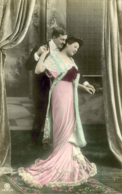Man making advances on fashionable lady by French Photographer
